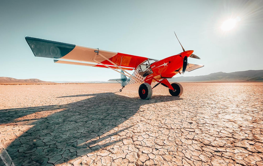 Trent Palmer's Kitfox Series V|Trent Palmer's Kitfox Series V|Unmanned aircraft|Early aircraft models flying|Hot air balloon in the sky|Trent Palmer's custom hanger