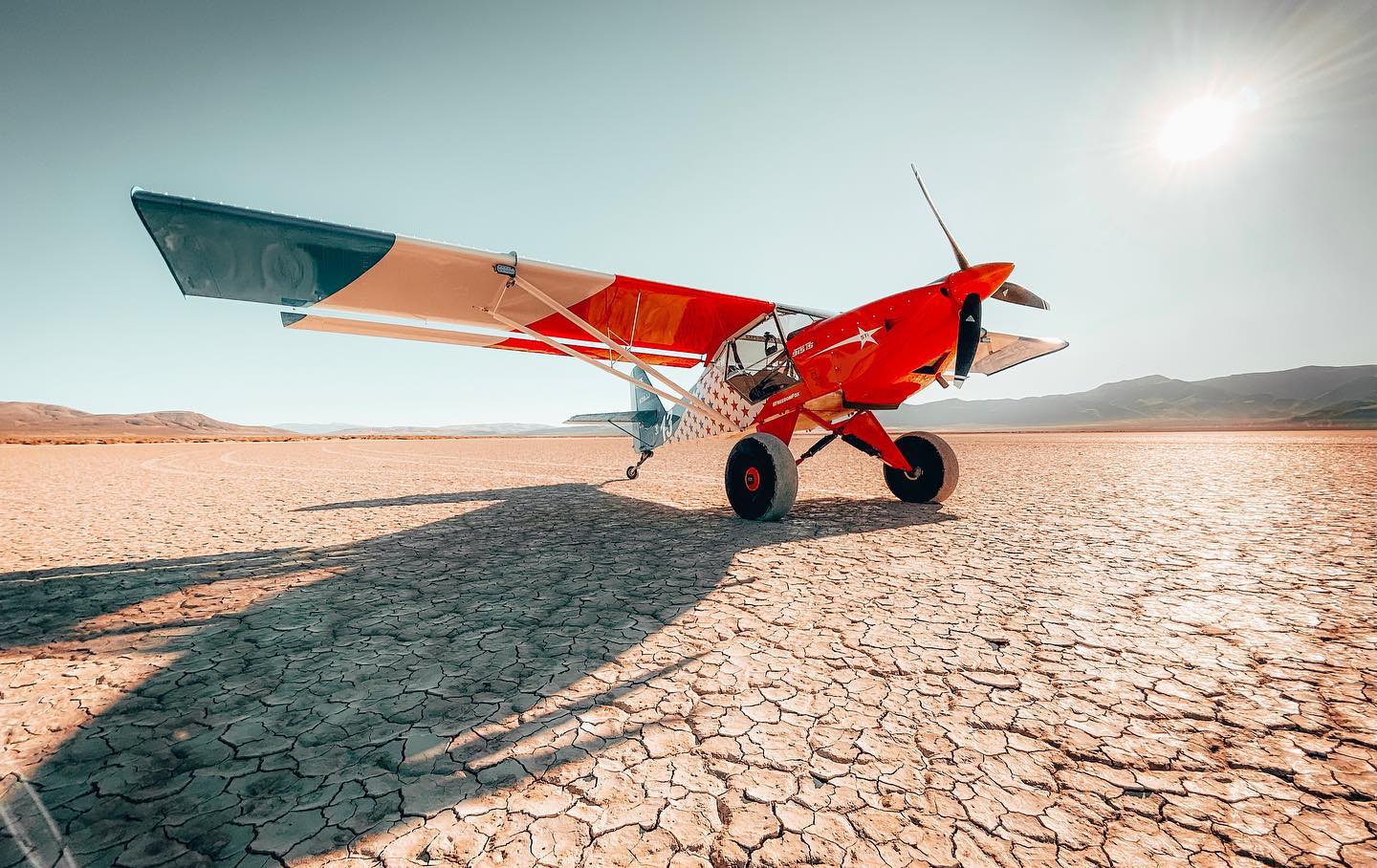 Trent Palmer's Kitfox Series V|Trent Palmer's Kitfox Series V|Unmanned aircraft|Early aircraft models flying|Hot air balloon in the sky|Trent Palmer's custom hanger