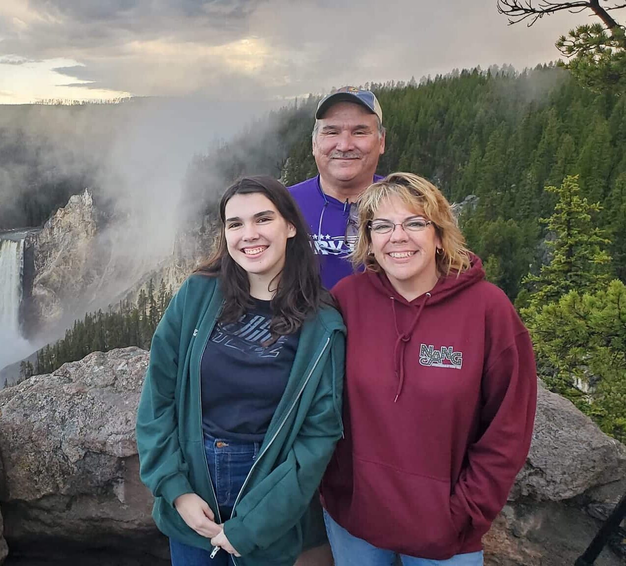 Nuttin' Adventured, Nuttin' Gained in front of a Waterfall