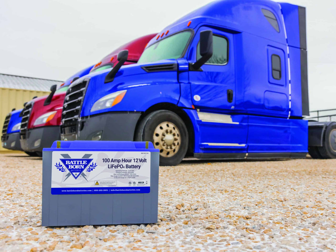 Battle Born Battery in front of long-haul trucks