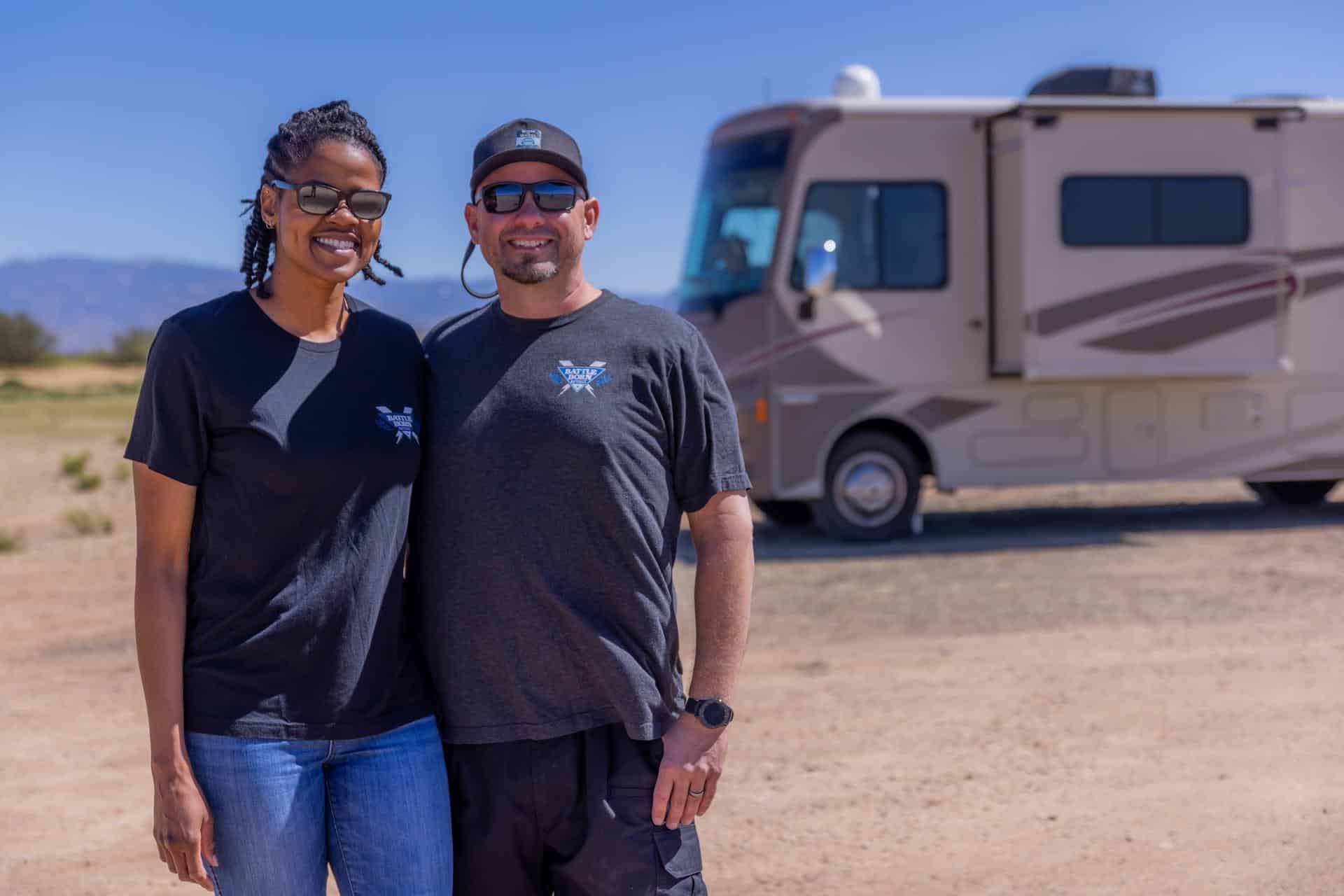 battle born partners at fmca rally|Motorized RV|Trucking Pulling a Fifth Wheel Being Towed by a Tow Truck|RV Love Towing Their Car Down a Road Surrounded by Mountains|Battle Born Batteries Web Graphic|You, Me and the RV Sitting Outside Their RV