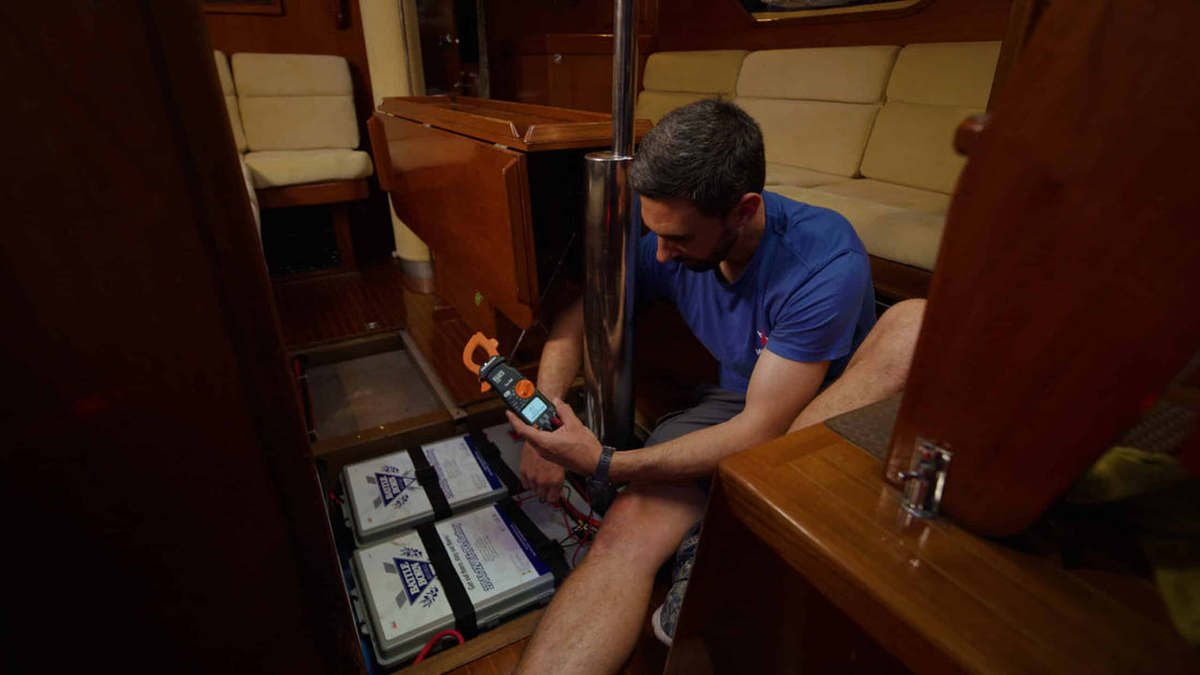 Connor Smith using a Multimeter on Battle Born Batteries