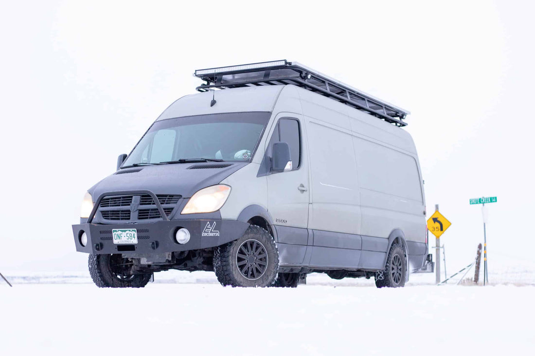 Van driving through the snow