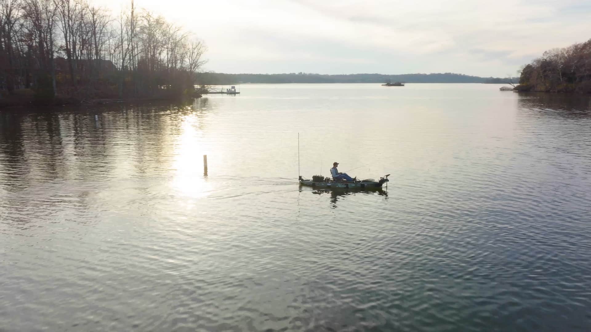 electric kayak motor at sunrise
