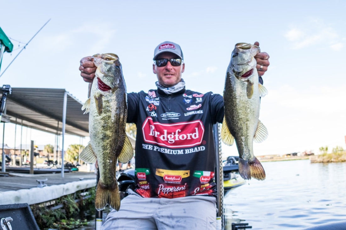 matt stefan holding up bass fish catch|fishing boat battery|Professional Angler John Cox Sitting On His Fishing Boat Holding a Battle Born Battery|Professional Angler Shaw Grigsby Using His Trolling Motor|Boat motor CCA and MCA Chart