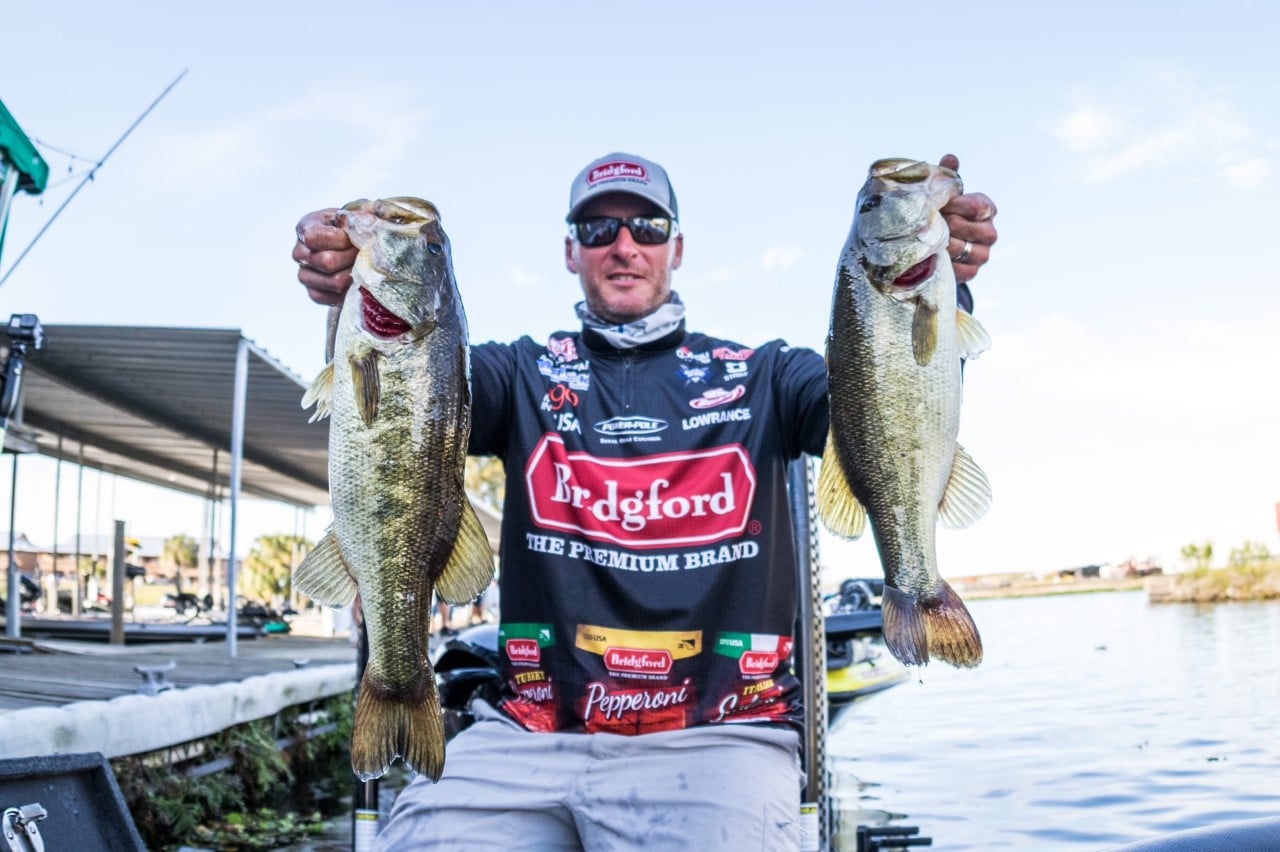 matt stefan holding up bass fish catch|fishing boat battery|Professional Angler John Cox Sitting On His Fishing Boat Holding a Battle Born Battery|Professional Angler Shaw Grigsby Using His Trolling Motor|Boat motor CCA and MCA Chart