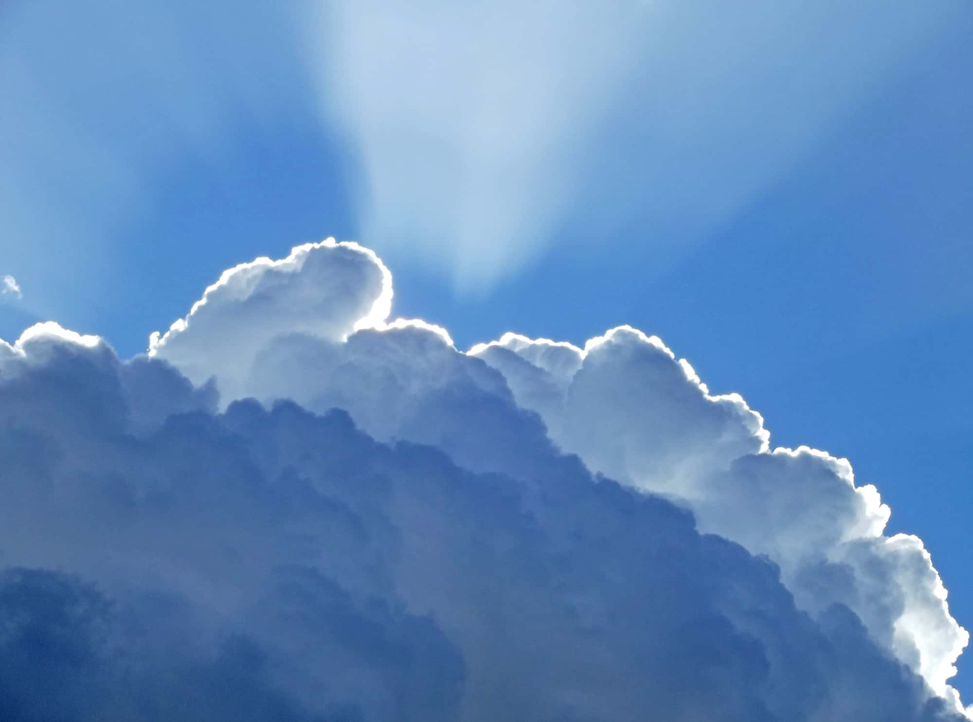 rays-of-sunlight-behind-a-cloud-2021-04-05-17-24-18-utc