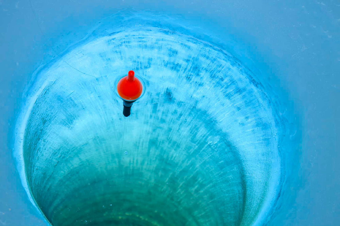 ice fishing battery box|ice-fish-finder|Ice fishing shacks at a Minnesota lake on a bright winter morning|man ice fishing without battery box