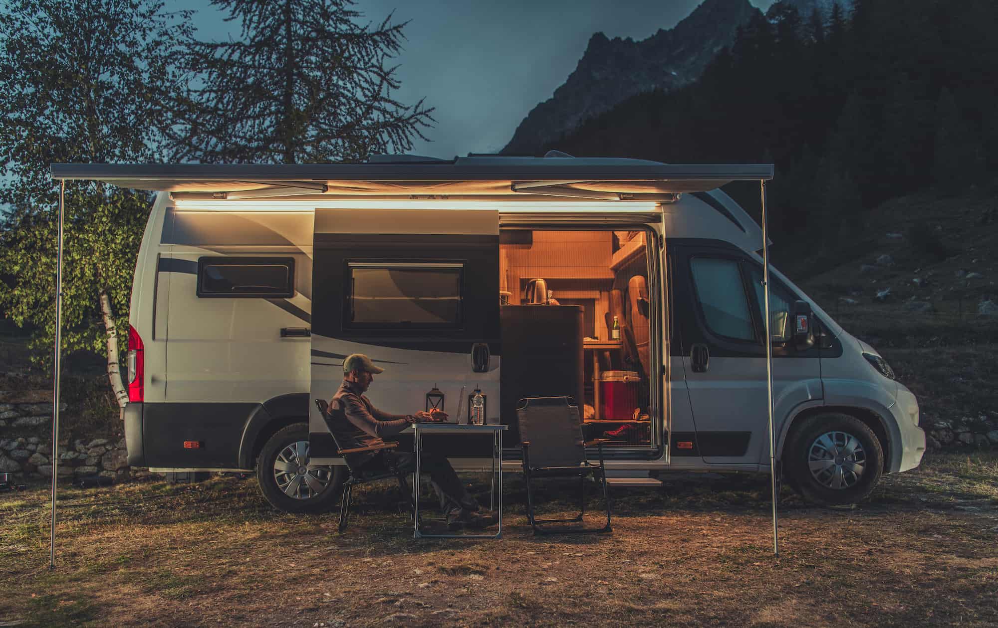 remote work with camping|EXPLORIST-5|Work on computer|MM2|Cheerful woman work outdoor with laptop computer lay down on a boat enjoying freedom and internet connection - concept of people and smart working modern lifestyle - new job office concept