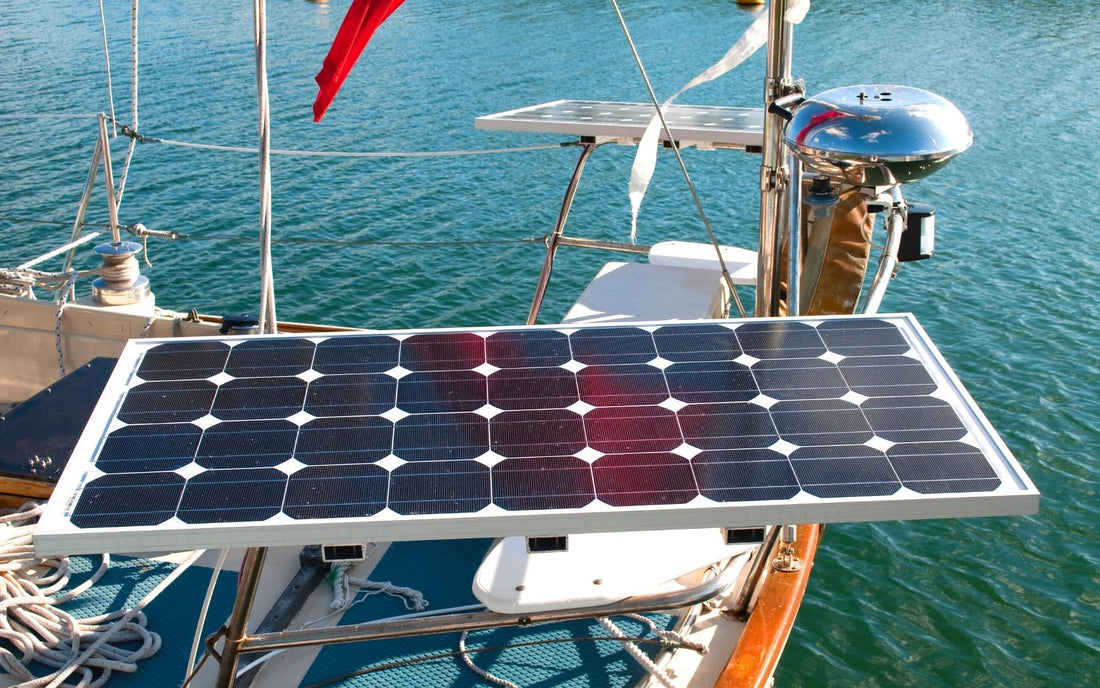 sailboat solar panels|Aerial drone photo of catamaran boat at blue clear ocean water|Aerial  view from drone of yacht in deep blue sea