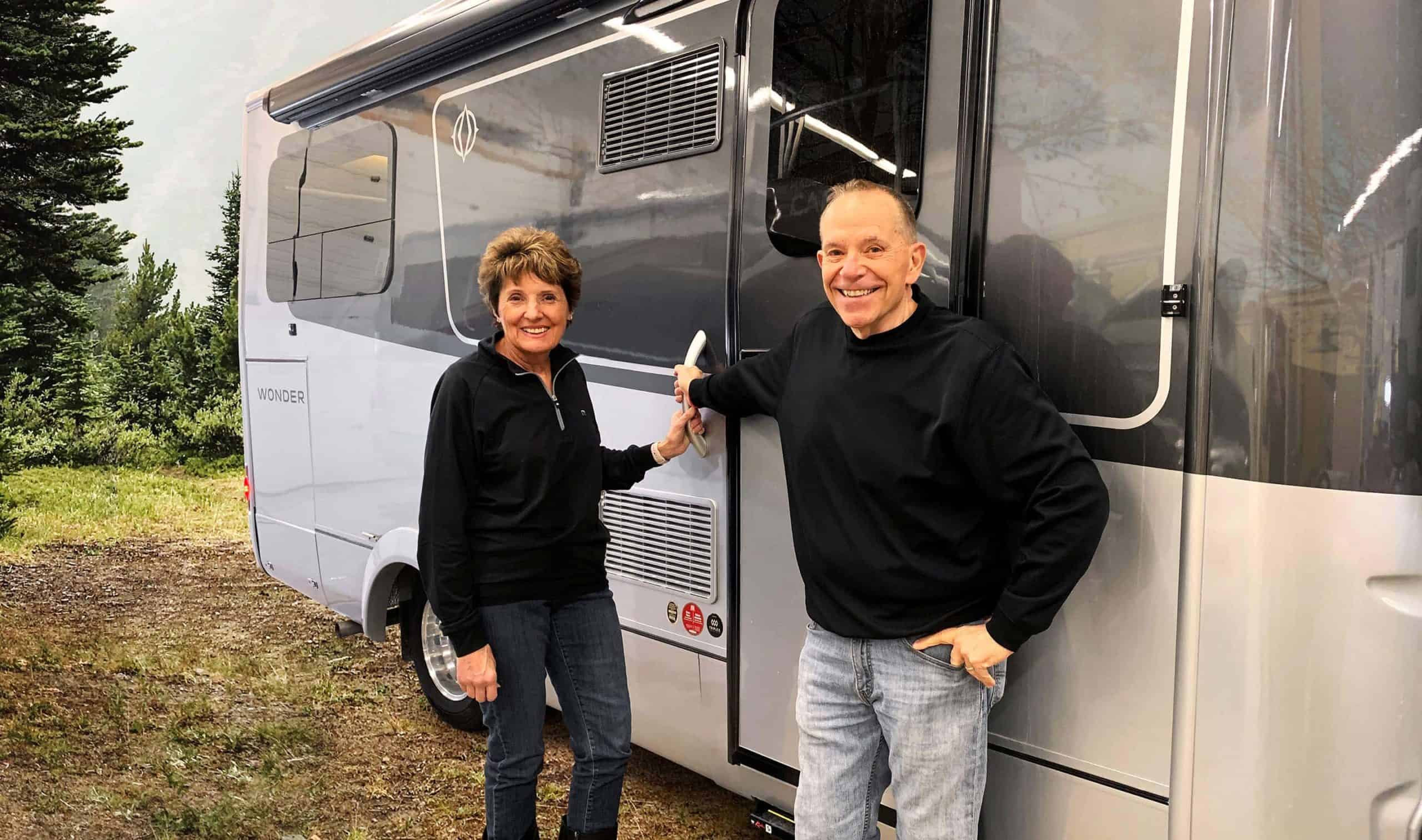 Mike and Jennifer Wendland in front of their RV