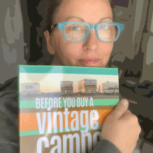 Crystal McCullough shows her book 'Before You Buy a Vintage Camper'