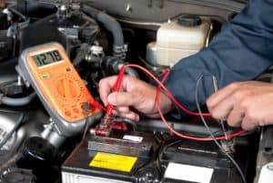 An auto mechanic uses a multimeter voltmeter to check the voltage level in a car battery. Is it in Low-Voltage Disconnect?
