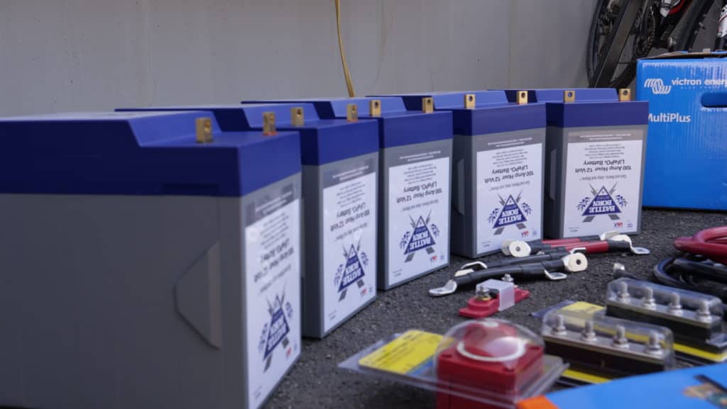 Row of Battle Born Batteries and other system accessories that can be installed in a Prevost motorhome
