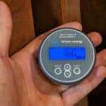 holding an RV battery monitor