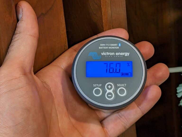 holding an RV battery monitor