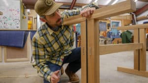 Andy Rawls in a workshop doing woodwork