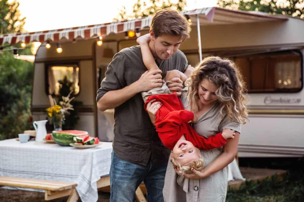 family with travel trailer