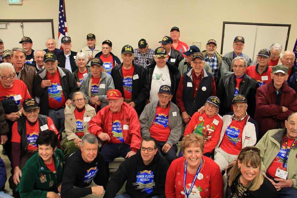 Group of veterans smiling for a photo