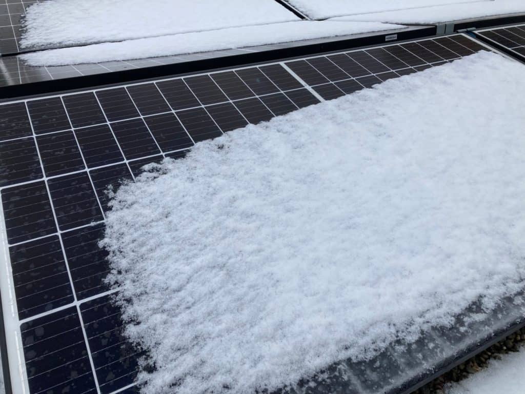 Snow on top of solar panels