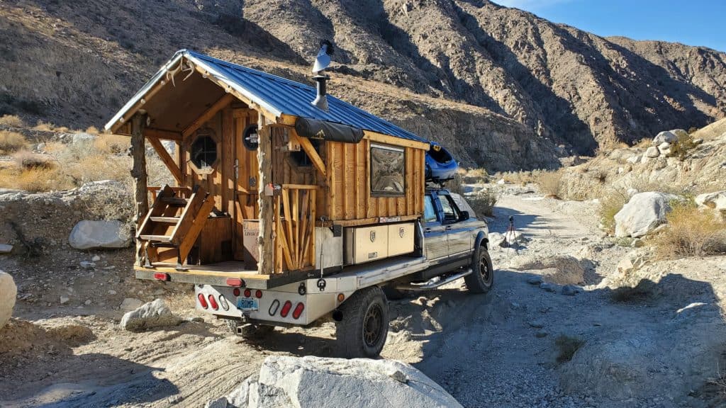 Tim Johnson Truck House Life's truck cabin on a backroad