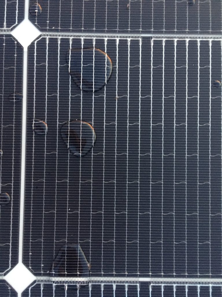 water drops on a solar panel