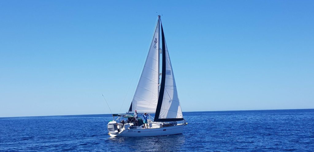 sailing bohemia's sailboat in open water