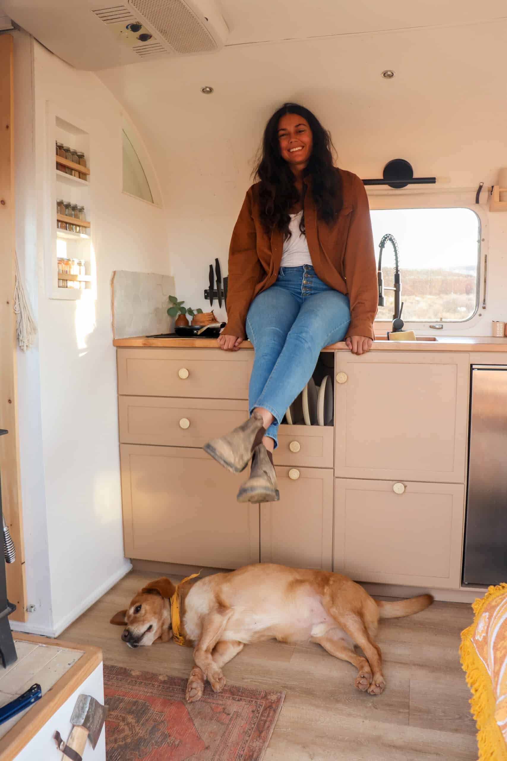 Danielle and Trip in the Kitchen of Their Renovated Airstream