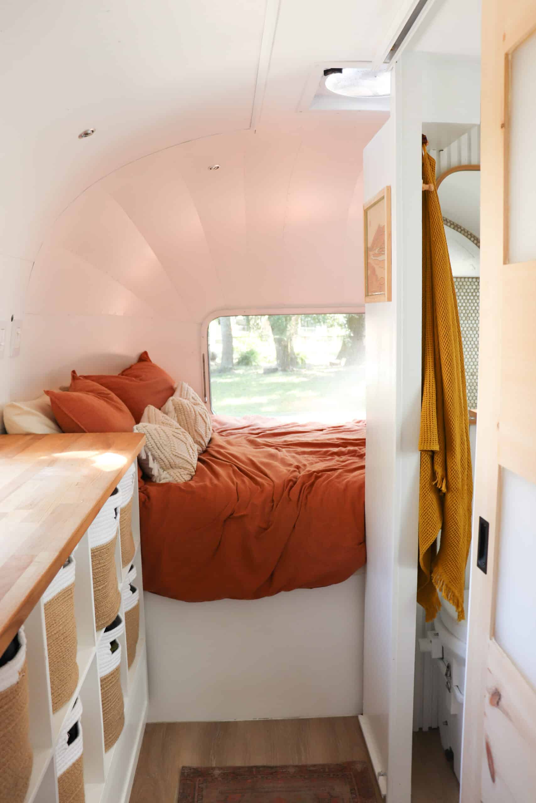 Bedroom and Bathroom in Slow Car Fast Home's Renovated Airstream