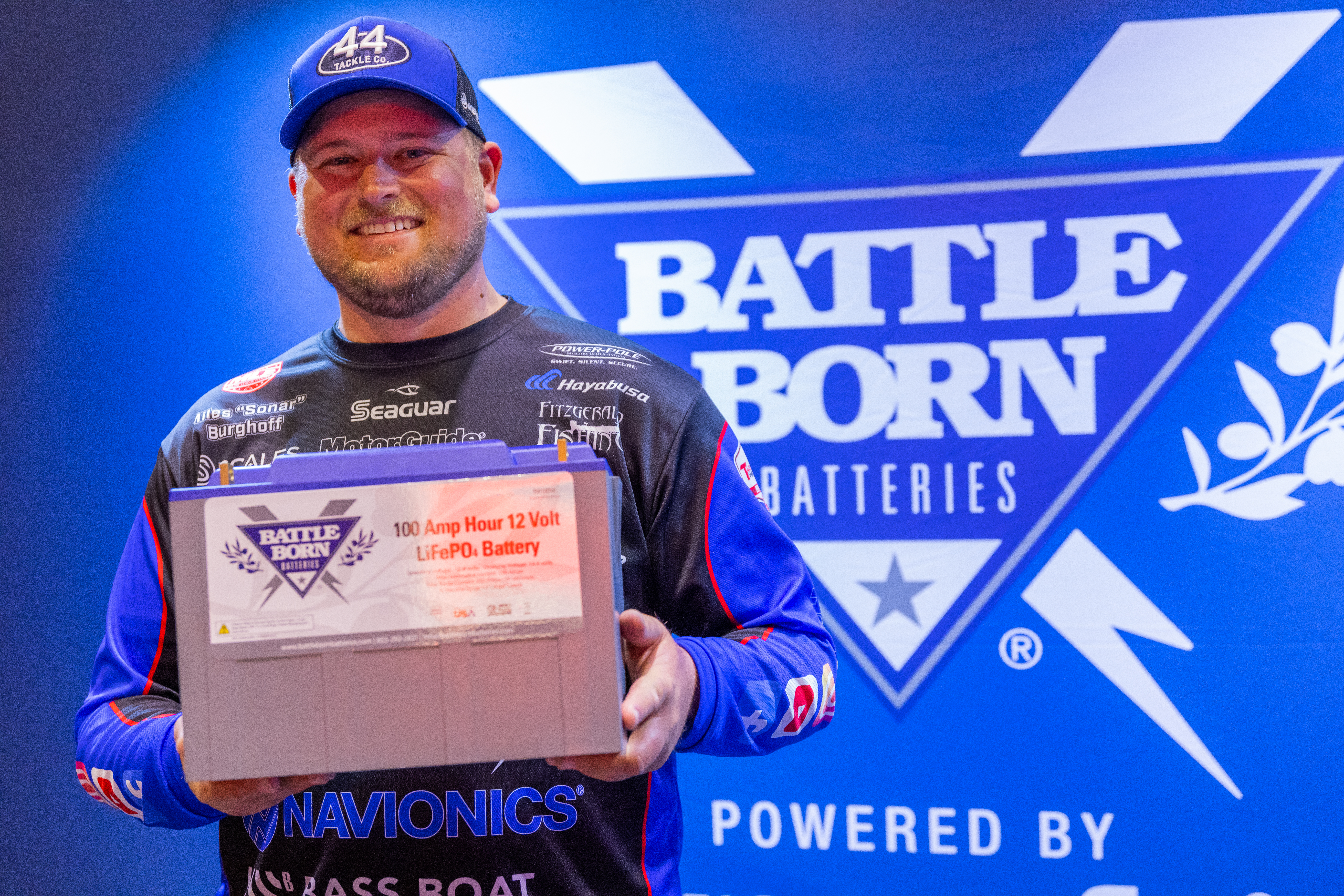 Professional Angler Miles Burghoff at the Battle Born Batteries Booth