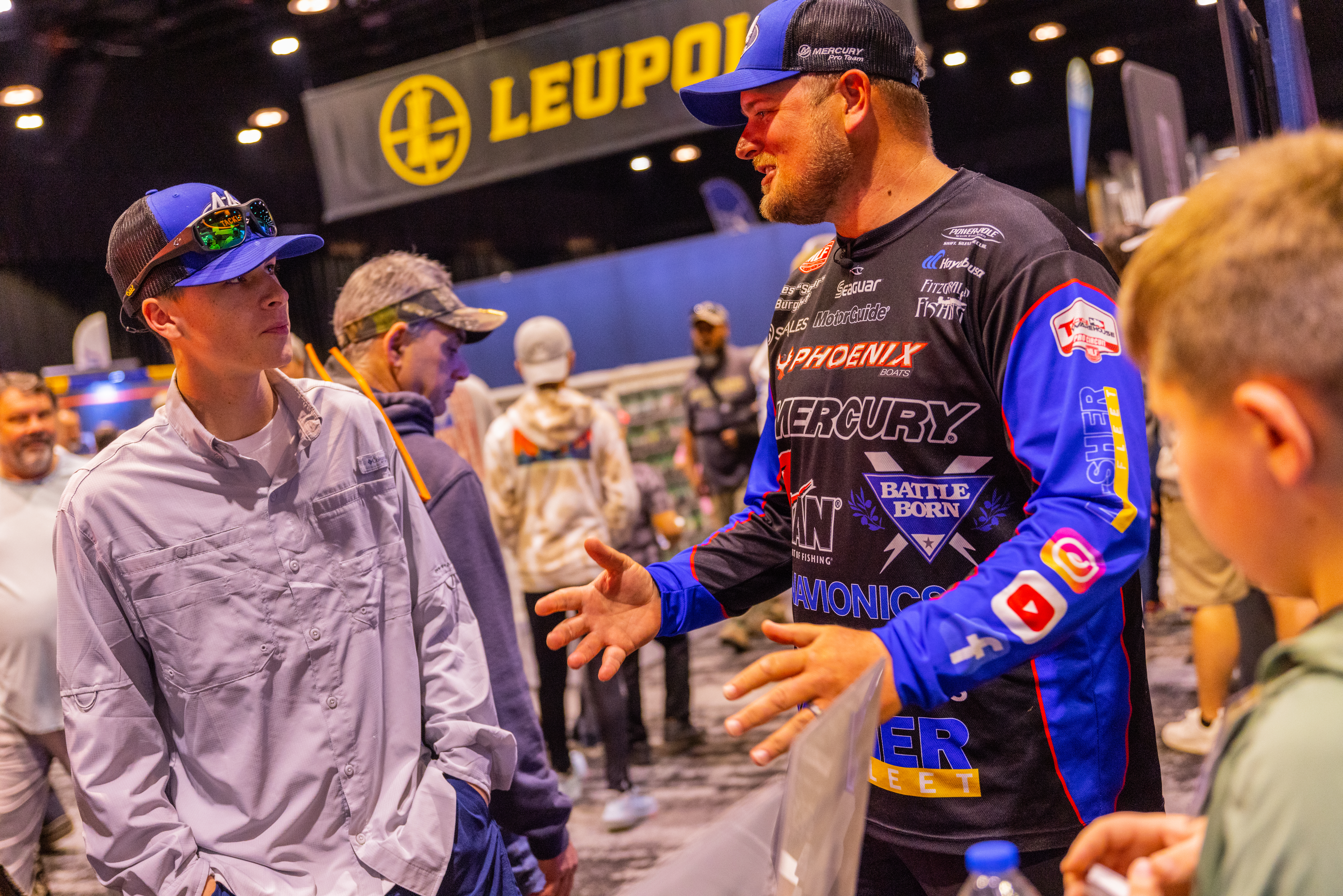 Professional Angler Miles Burghoff at the Battle Born Batteries Booth
