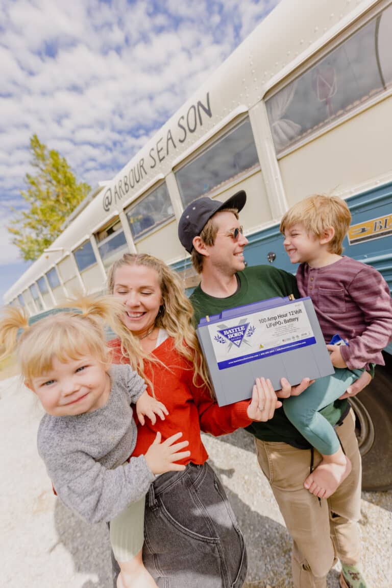 Arbour Season Family in Front of Their Converted Skoolie