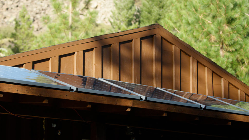 solar panels on an off-grid cabin roof