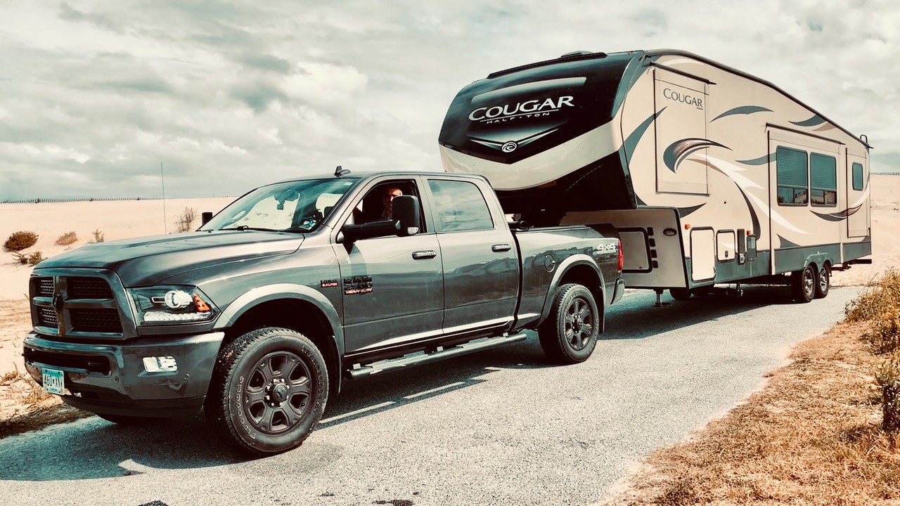 Cougar RV Being Pulled By a Ram Pickup Truck