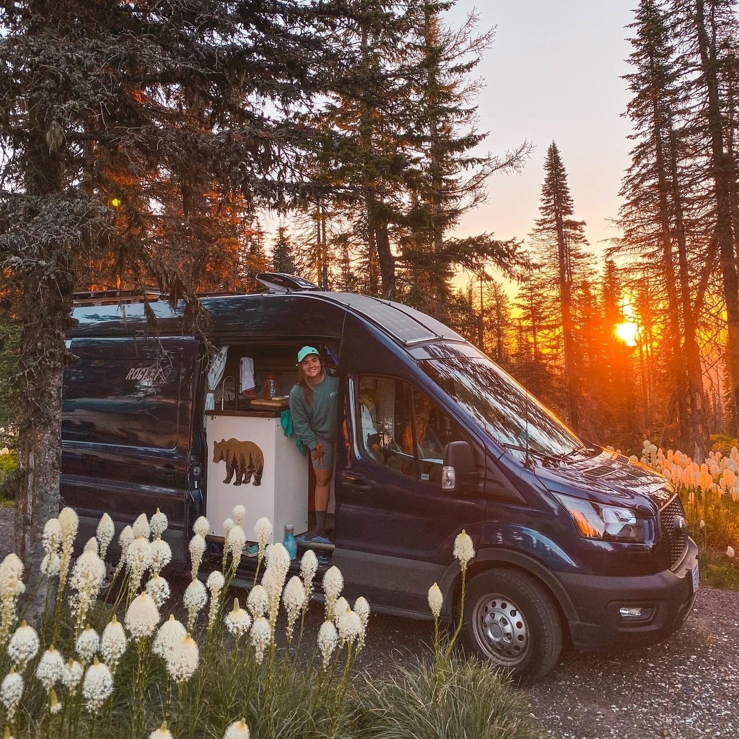 Colby with the Engineers Who Van Life Van in the Forest at Sunset