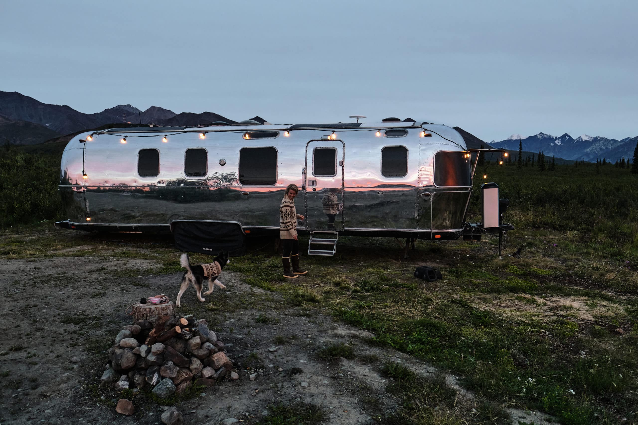Kendall Strachan and Her Puppy in Front of Their Airstream