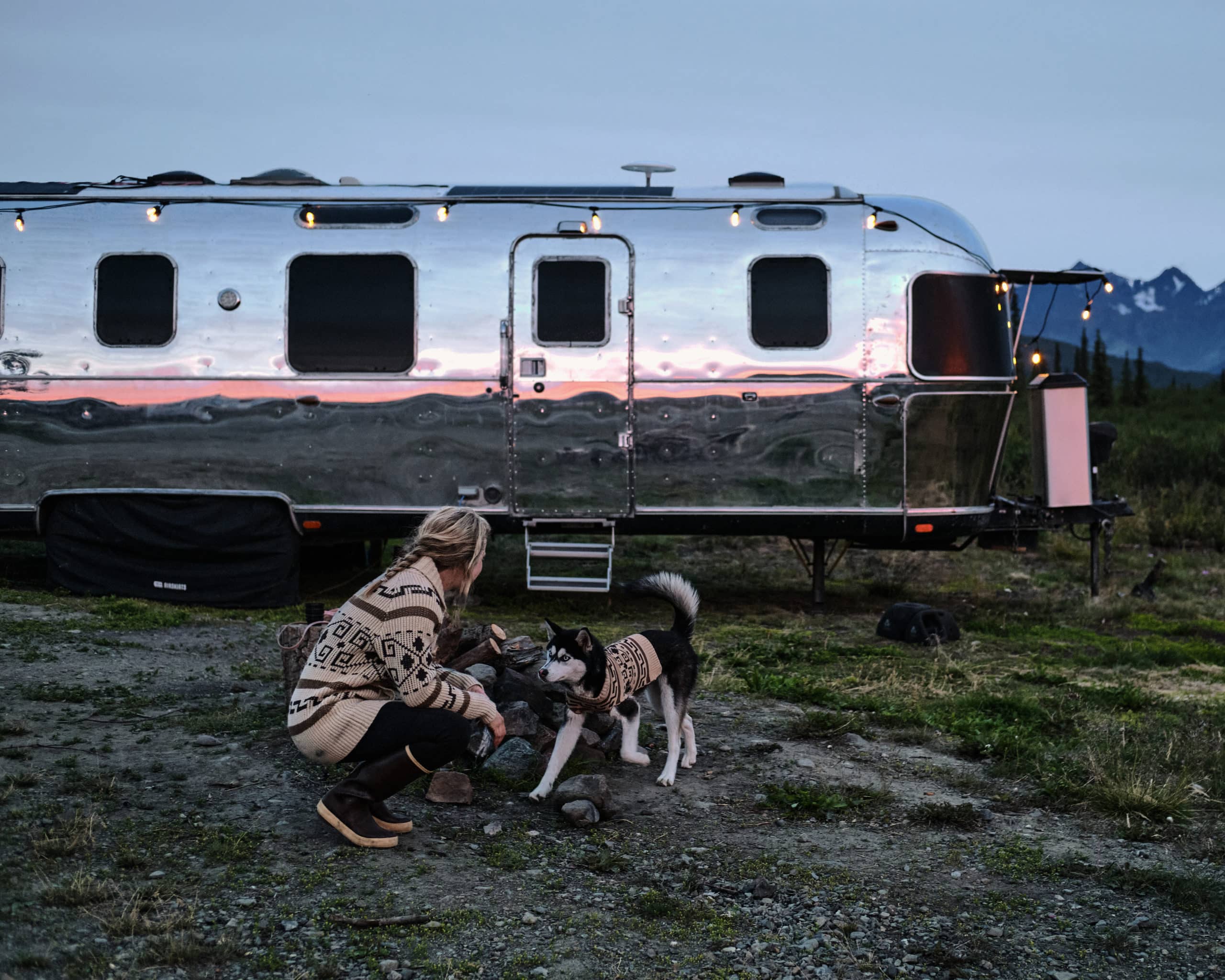 Kendall Strachan and Her Puppy in Front of Their Airstream