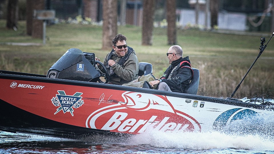 pro anglers on bass boat with lithium batteries