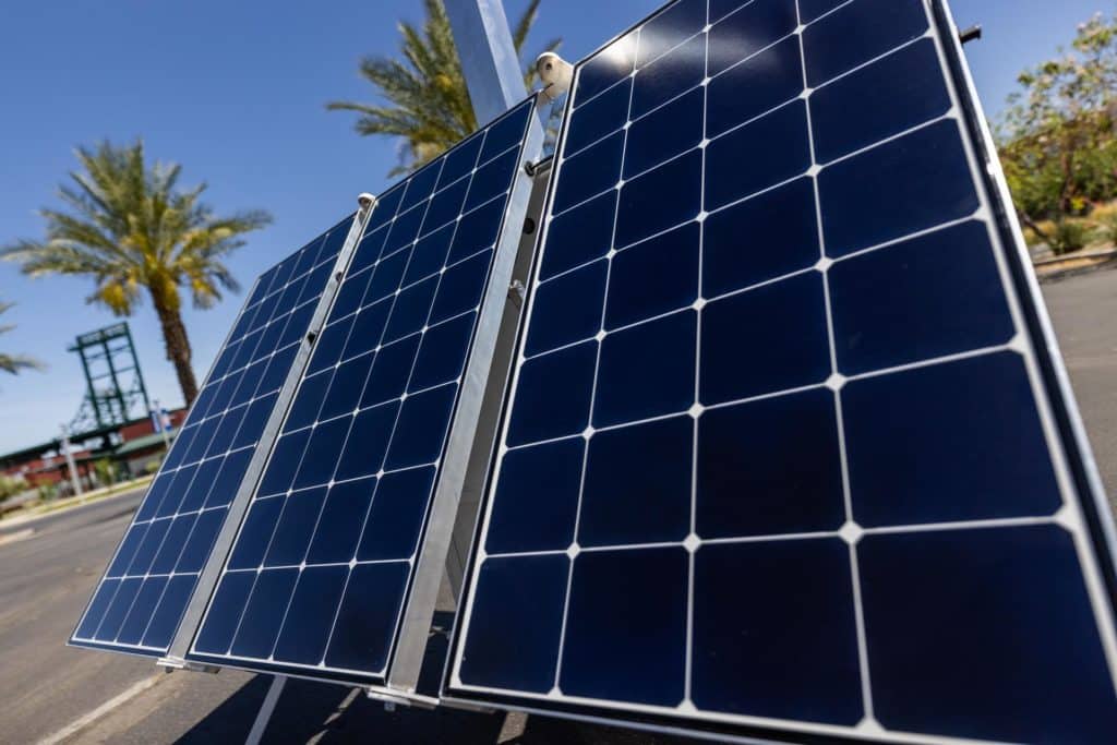 Up close of solar panels outside facing the sun