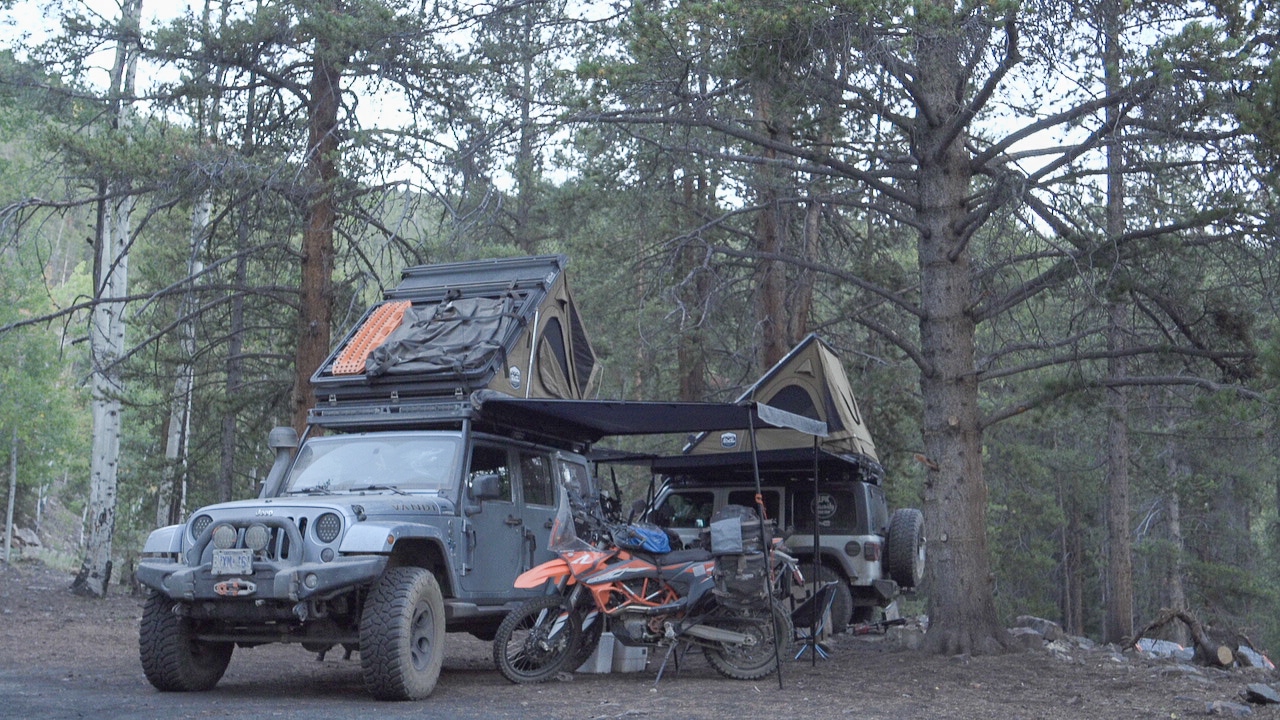 Vandi and Worsley's rig parked at a campsite