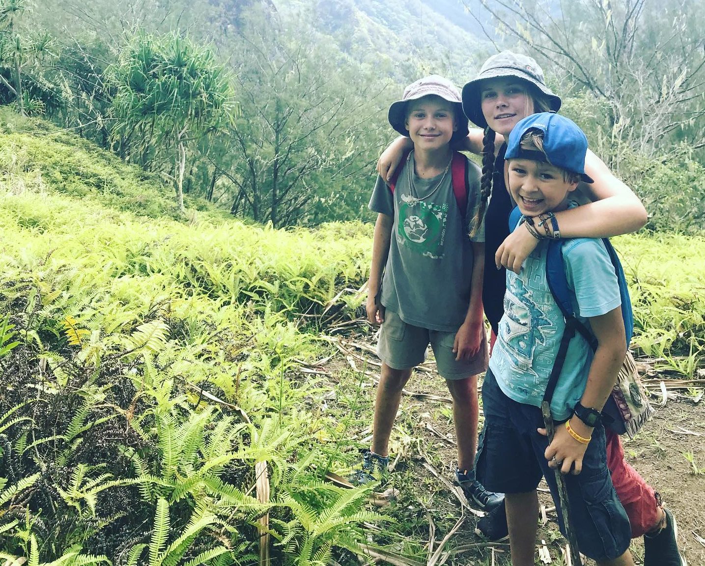 Rowan, Darry, and Yewan on a hike
