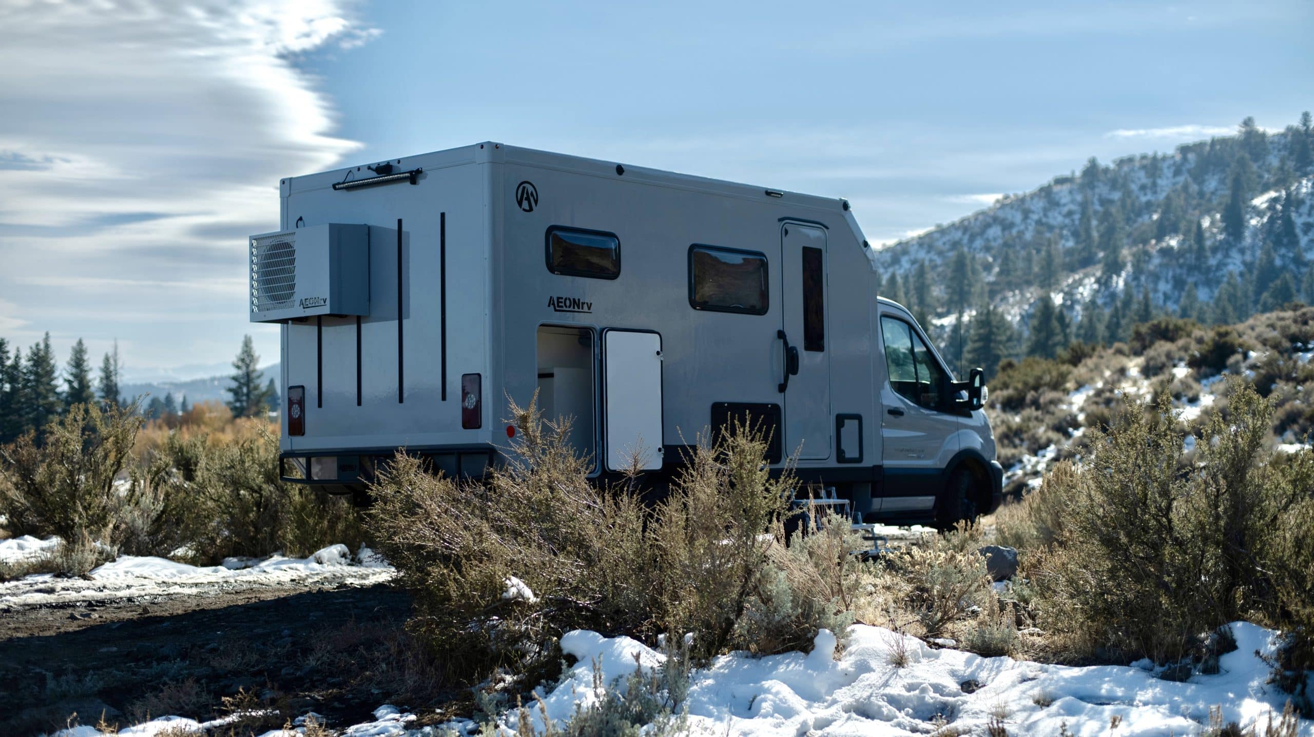 AEONrv parked off-road in the snow