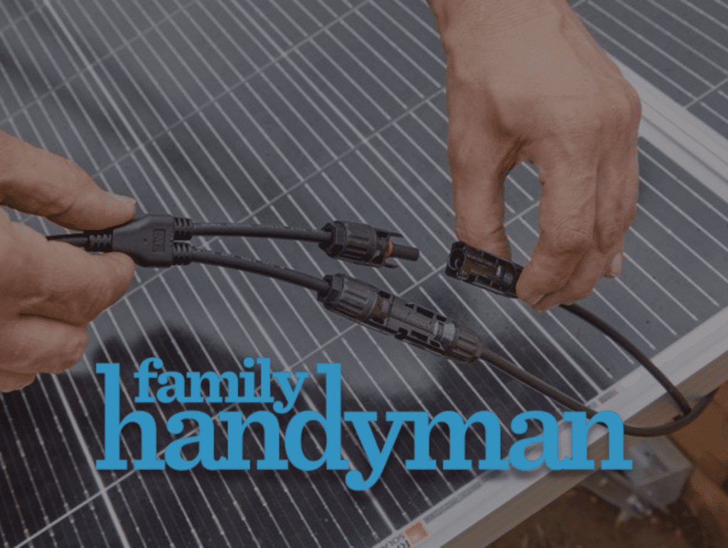Family Handyman Logo Over Solar Panels Being Wired In
