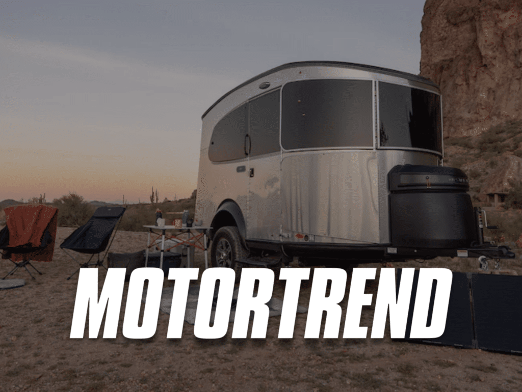 Motortrend Graphic Over an Airstream Basecamp Trailer in the Desert