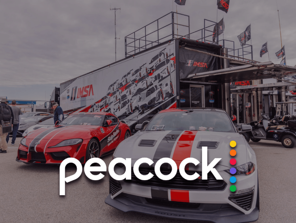 Peacock Logo over IMSA Truck and Cars