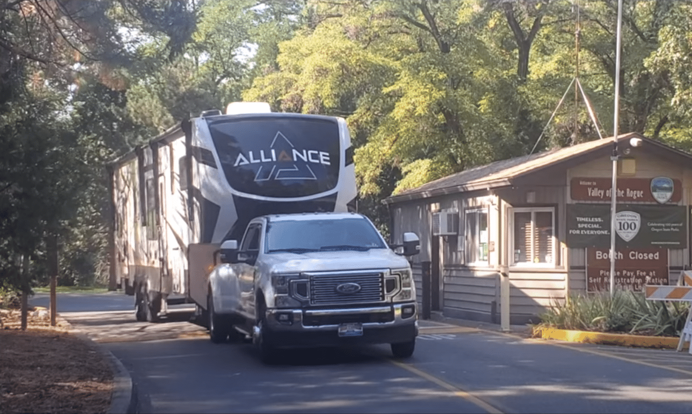 Alliance Trailer being towed past a ranger station