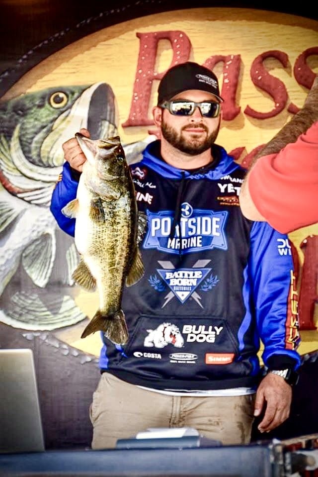 John McCutchan holding a fish