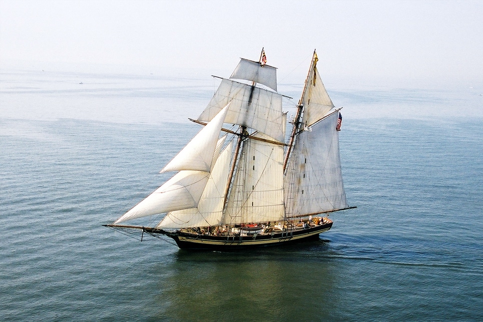 The Pride of Baltimore II sailing on the water