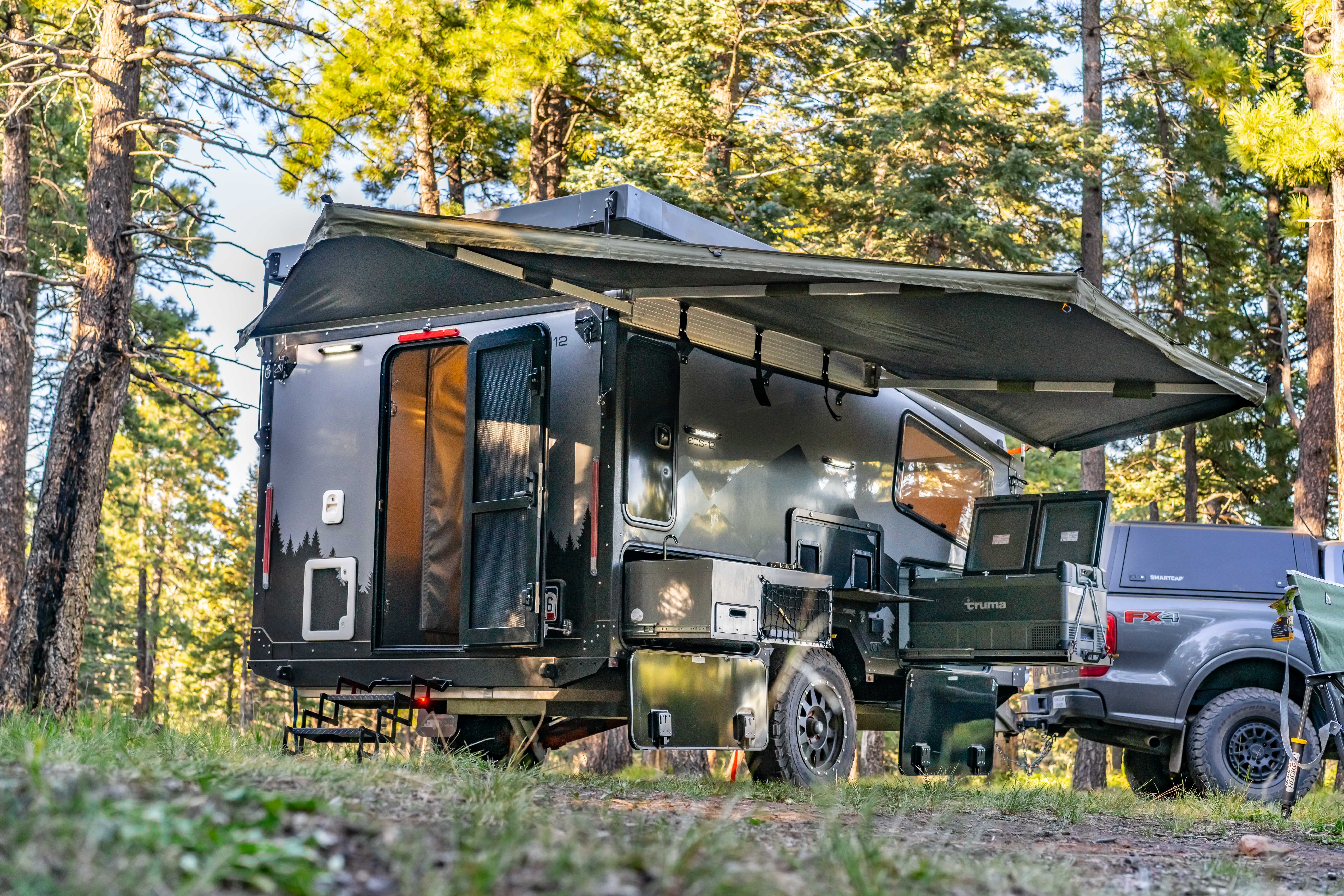 Boreas Camper parked at a campsite
