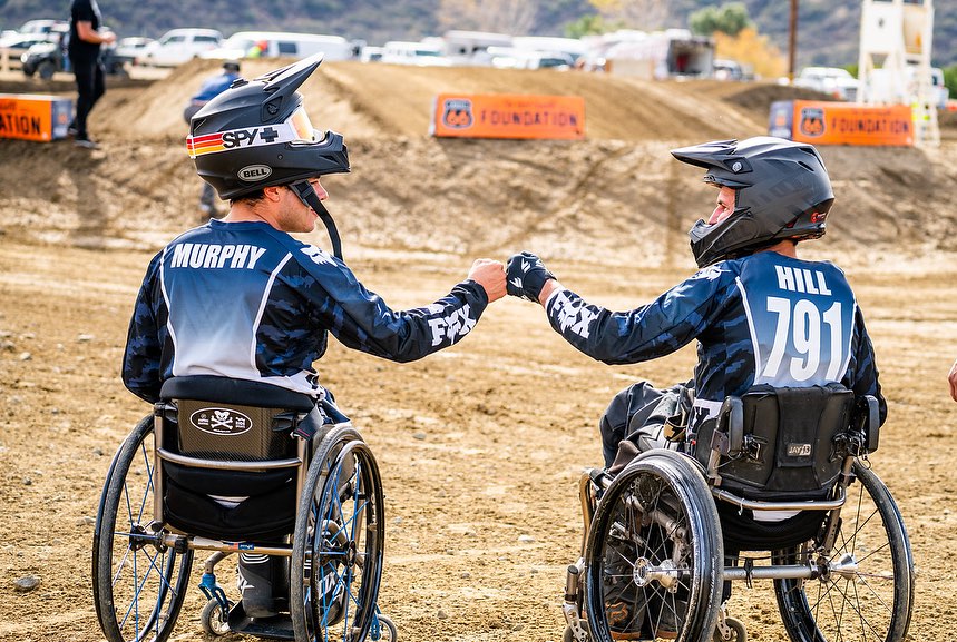 High Fives Athletes at Motocross Race